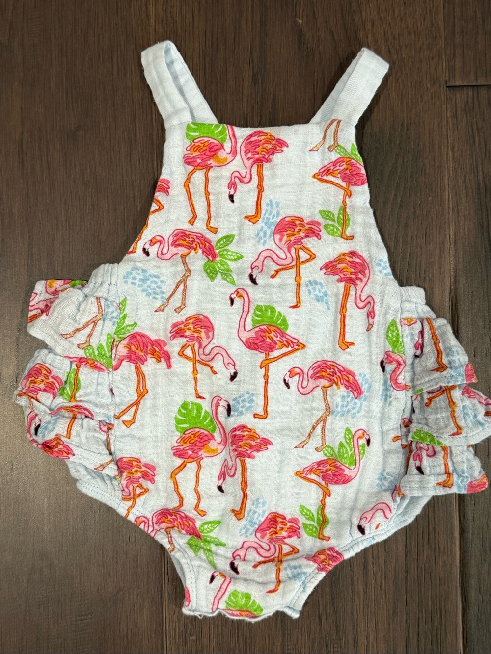 MudPie 6-9 month flamingo ruffle romper with cross cross back